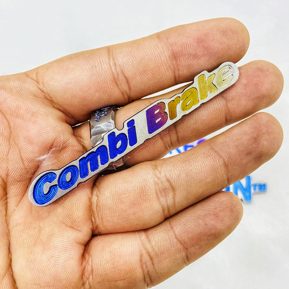 EMBLEM COMBI BRAKE TITANIUM ORIGINAL VIETNAM