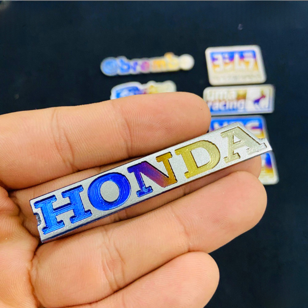 EMBLEM  TULISAN HONDA TITANIUM ORIGINAL VIETNAM